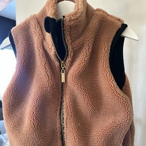 Little Bipsy caramel colored Sherpa vest with gold zipper. Worn once. Like new.